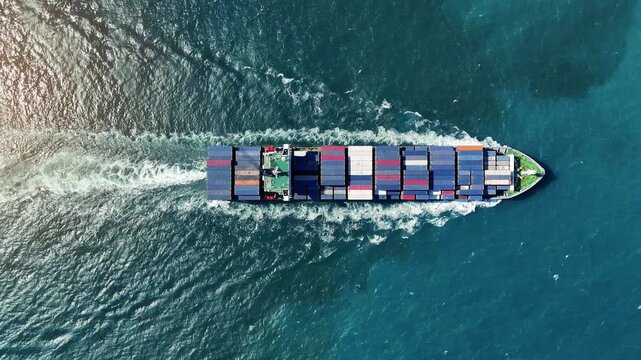 Cargo container Ship, cargo vessel ship carrying container and running for import export concept technology freight shipping sea freight by Express Ship. top view freight shipping technology.	
