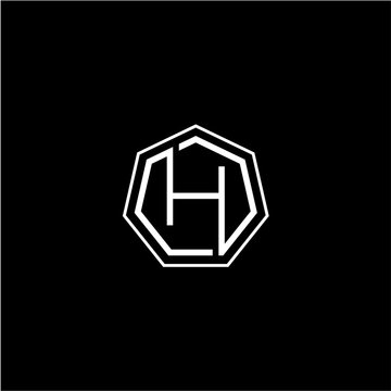 Modern geometric H monogram logo design within a sleek heptagonal frame on a black background