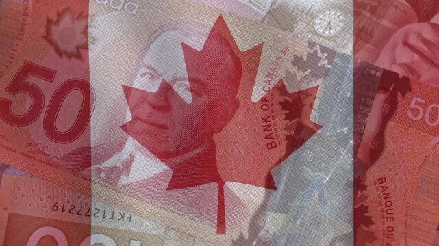 Canadian 50 and 100 Dollars close up. CAD currency with Canada flag background. Canada economy footage.