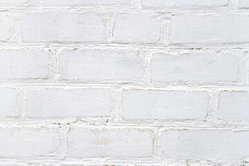 Obraz premium Texture of white vintage brickwork. Whitewashed brick wall close-up