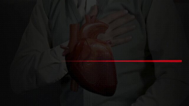  A man suffering from heart attack. Hand hold chest with heart attack symptoms.