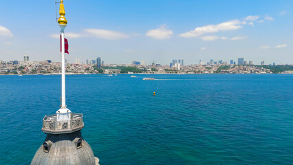 Istanbul, Turkey. European shore of Bosphorus Strait with passenger ferries and water taxis sailing on clear sunny day. Aerial View © Video Render