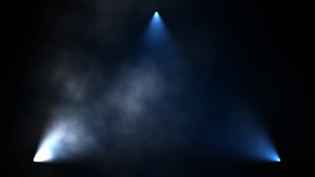 A swirling, smoky triangular formation of white and blue light against a black background, creating an abstract, ethereal texture.