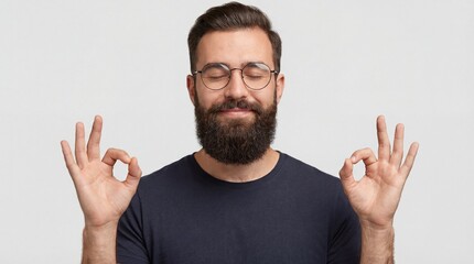 Man meditating with fingers forming OK signs in air