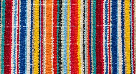 Obraz premium Vibrant multicolored stripes pattern viewed from directly above in a textile illustration