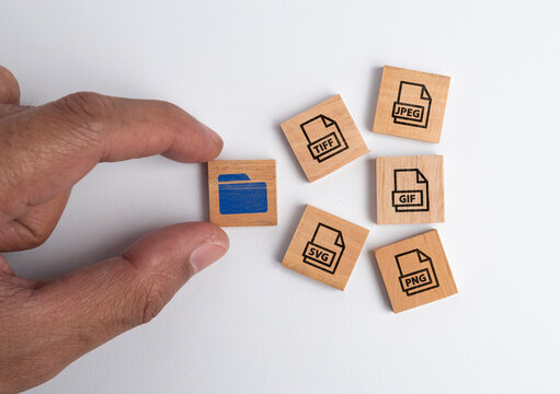 Tag wood with icons of 5 types of image files namely JPEG, PNG, GIF, TIFF and SVG. The concept of saving files in the form of an image