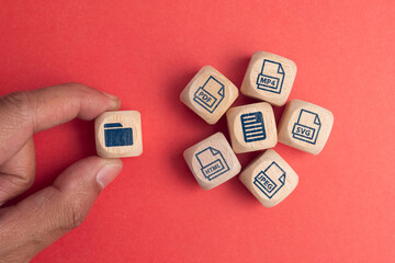 file icons are arranged into folders. Concept document management system or DMS. © Luqman Aditiamala