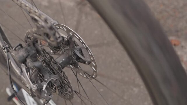 Detailed close up of bicycle drivetrain with rear cassette and disc brake