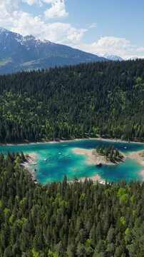 Grisons canton Switzerland Lake Cauma turquoise water Swiss alpine vertical video