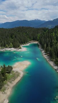 Lake Cauma Caumasee Switzerland Swiss alpine nature landscape aerial, vertical video