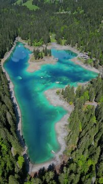 Caumasee Lake Cauma Swiss Switzerland alpine nature landscape aerial, vertical video