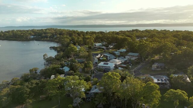 Macleay Island Homes In Morning Summer Sun Brisbane Australia Drone Pull Back Rise 4K 60FPS