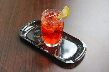 Refreshing Red Fruit Cocktail with Melon Shreds and Basil Seeds