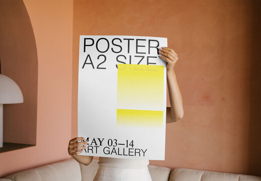 Mockup Of Woman Holding Unframed A2 Customizable Poster