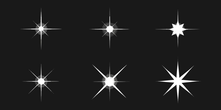 A collection of bright white starbursts and sparkling light effects on black