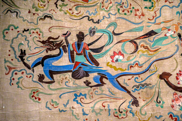 The ancient mural relics of the Mogao Caves in Dunhuang, China. © youm