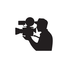 silhouette of a man with a video camera