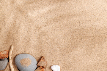 A tropical summer background featuring soft beach sand with delicate palm leaf shadows