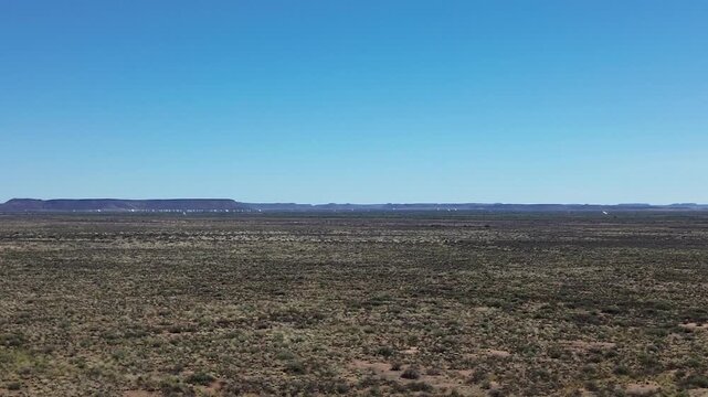 Square Kilometer Array radio telescopes from a distance in the Karoo, South Africa. 4K aerial Video.