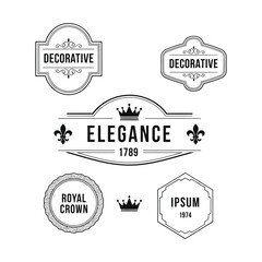 Obraz premium Elegant Decorative Elements and Royal Crowns in a Vintage Illustration
