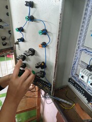 electrical circuit work on the electric motor installation panel