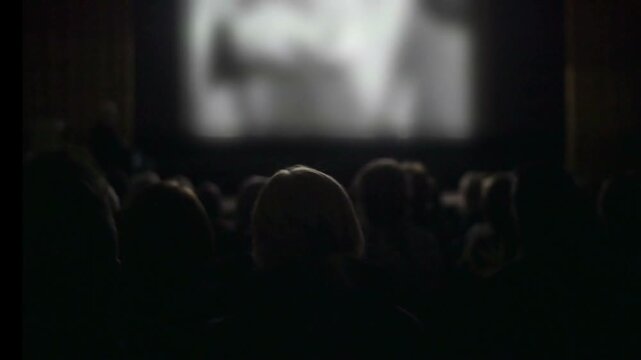 Theater, watching movie and happy family Men women. Audience, cinema comedy entertainment film. crowd Many People sitting on chairs or seats in hall. enjoy show. eating popcorn. atmosphere. big screen