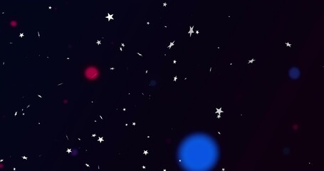 Obraz premium Twinkling white stars and colored bokeh drifting in navy backdrop with streaks and spark flecks