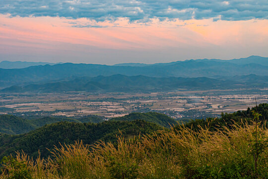 Beautiful Landscape of mountain layer in morning sun ray and winter fog at Doi Laem, Mea Ai in Chiangmai, Thailand