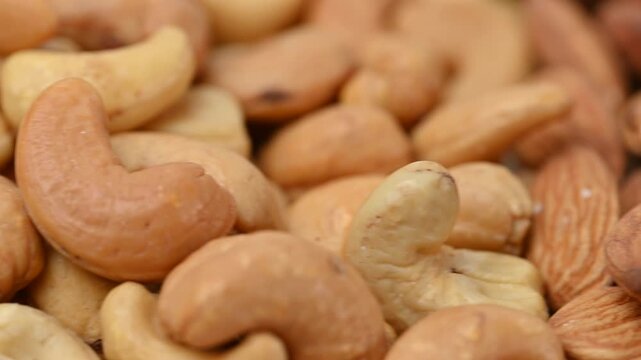 video of a mix of almonds, pistachios, cashews, and pine nuts