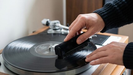 Gentle Cleaning of Vinyl Record with Velvet Brush on Turntable
