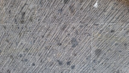 Rough Grey Concrete Texture with Diagonal Grooves