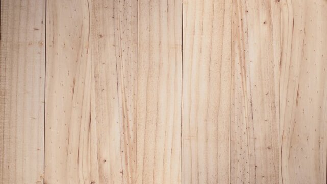 Vertical wooden planks seamlessly arranged creating a beautiful natural wood texture background