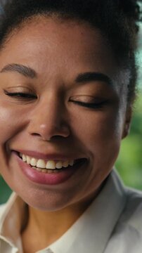 Portrait surprised African American business woman looking at camera with excited expression happy businesswoman female girl open mouth amazing emotion work job success achievement in city downtown