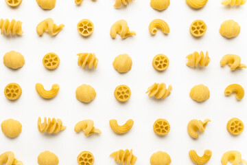 few uncooked pasta types on white background. different pasta, insalata di pasta. texture, food...