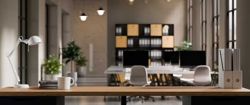Minimalist workspace with wooden desk, lamp, stacked books, and open notebook in modern office 3D render