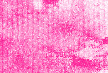 Creative bubble wrap texture &mdash; hot pink watercolor background in rose tones. Transparent plastic bubbles &mdash; abstract glamour composition for music covers, contemporary design