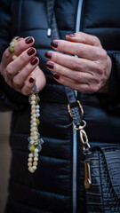 Rosary being held in hands