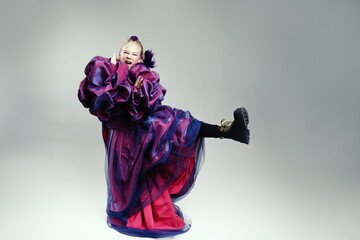 Rebellious Girl in Purple Gown and Combat Boots