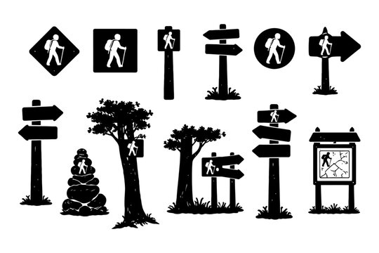 Silhouette hiking trail signs in various shapes and directions.