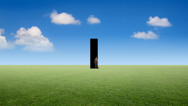 Conceptual design man standing near black portal in open field. Concept of career transition, risk decision, entering new reality, business change, transformation and conceptual future thinking.