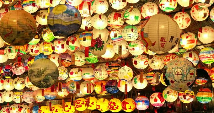 The park displays thousands of paper lanterns hand-painted by locals, symbolizing the traditional culture of the Lantern Festival and the community's shared wishes for blessings.