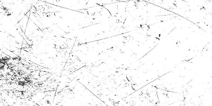 Black and white textured background with numerous fine scratches and speckles abstract