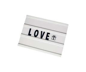 white tablet with the word love written on it