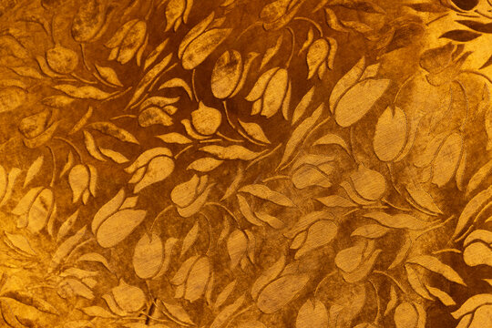 Gold floral jacquard fabric texture background