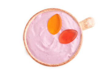 Purple Yogurt, with jelly candy isolated on white, top view, close up
