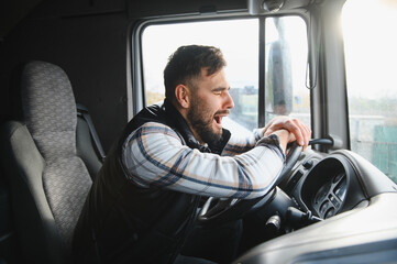 Tired truck driver yawning feeling fatigue while driving