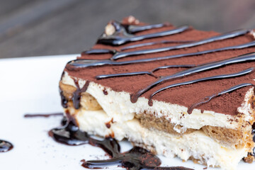 Close-Up of Coffee Tiramisu with Chocolate Sauce