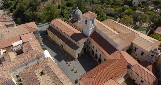 Aerial view of the small church of San Francesco, located in the historic center of Tropea, Calabria, Italy. This chapel was once dedicated to San Pietro ad Ripas. In front is a small square.