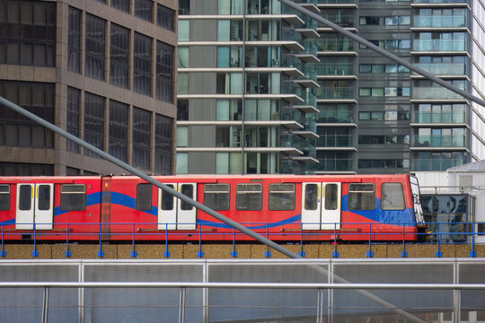 Train passing through Canary Wharf in London, United Kingdom.