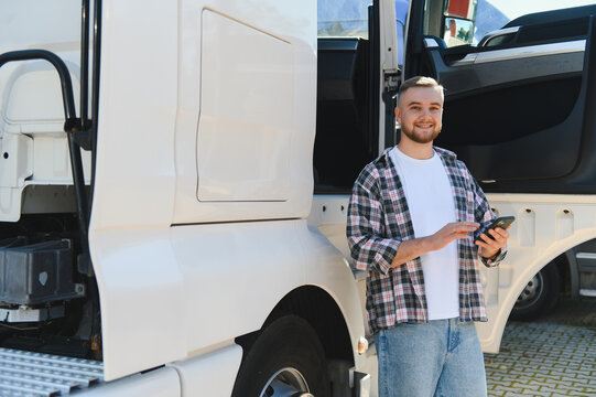 Truck driver using phone checking logistics application